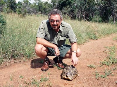 David Haggett observing a tortoise in its natural habitat in South Africa